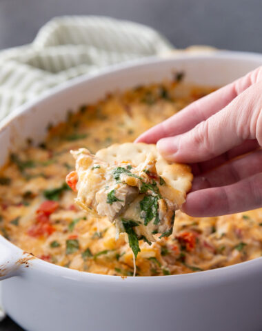 Marry Me Chicken Dip, a delicious cheese dip that is loaded with sun dried tomatoes, chicken, cheese, and more.