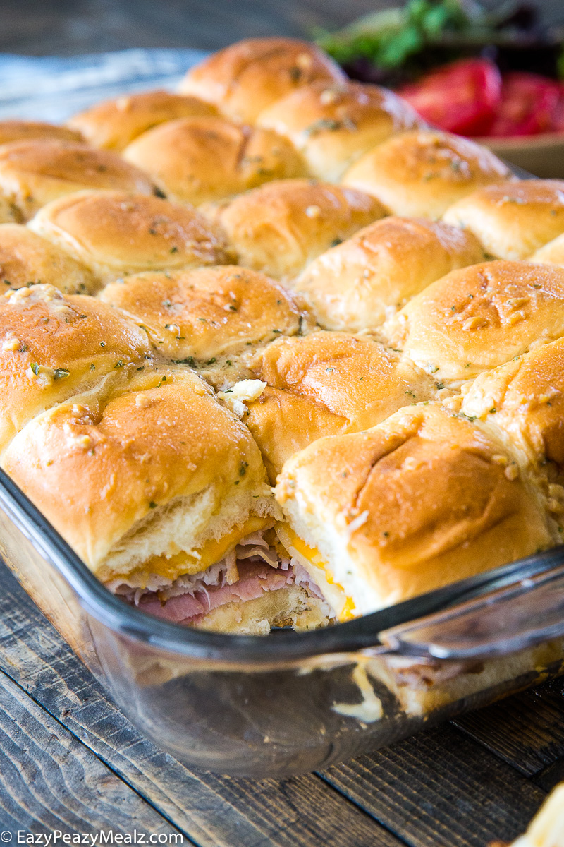 A tray of club sandwich sliders