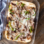 A Philly Cheesesteak Bake, loaded with cheese, onions, peppers and steaks.