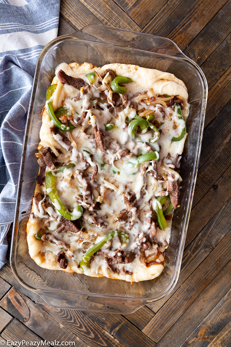A Philly Cheesesteak Bake, loaded with cheese, onions, peppers and steaks. 