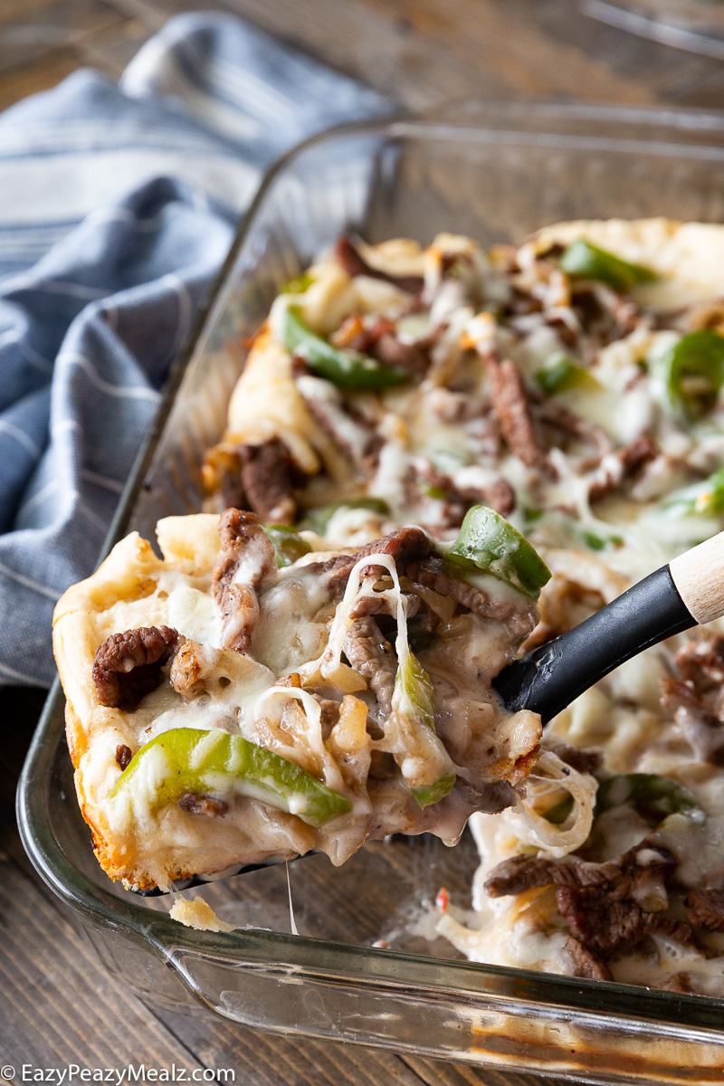 Philly Cheesesteak Bake, a delightful combo of bread, cheese, steak, peppers and onions. 