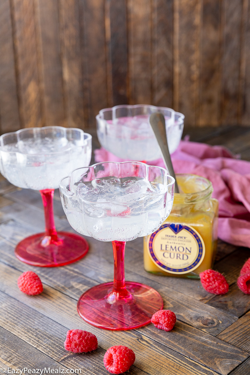Making raspberry lemonade spritz with lemon curd cold foam