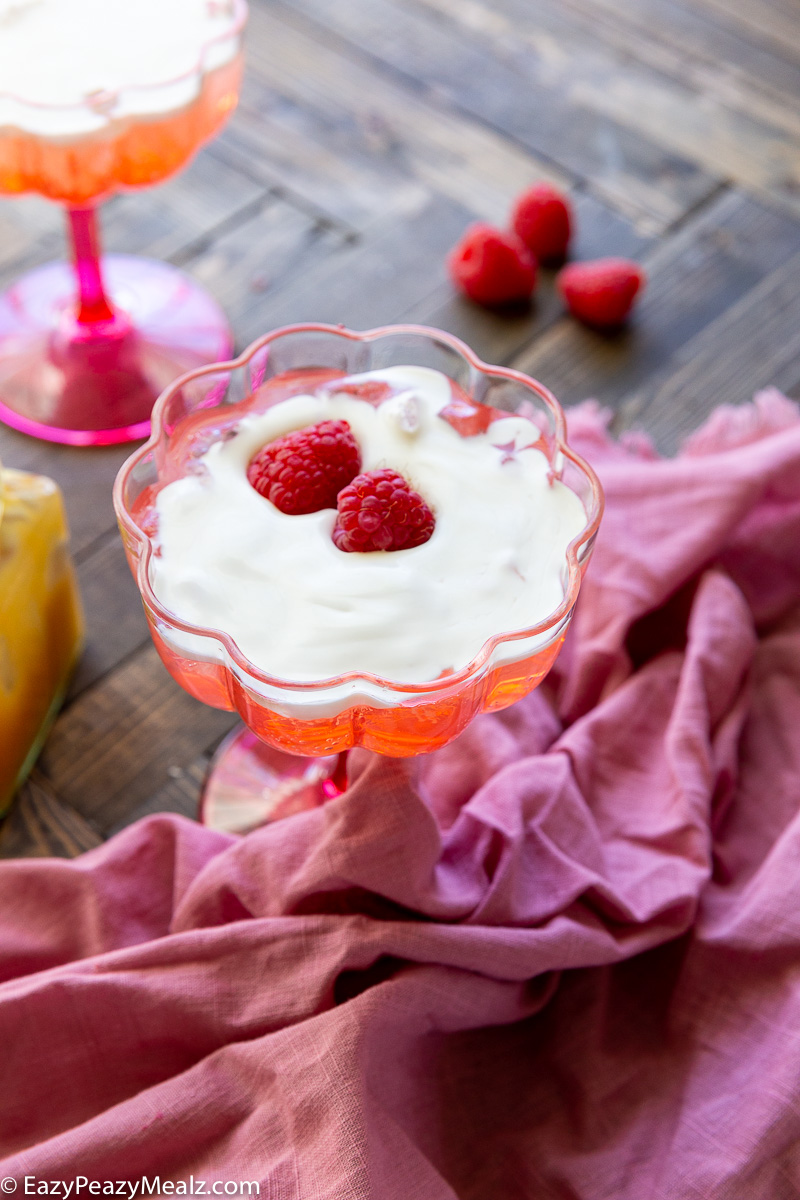 Lemon curd cold foam topped raspberry lemonade spritz