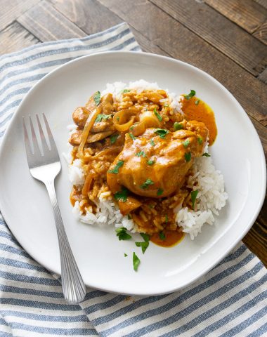 A plate of rice with slow cooker butter chicken