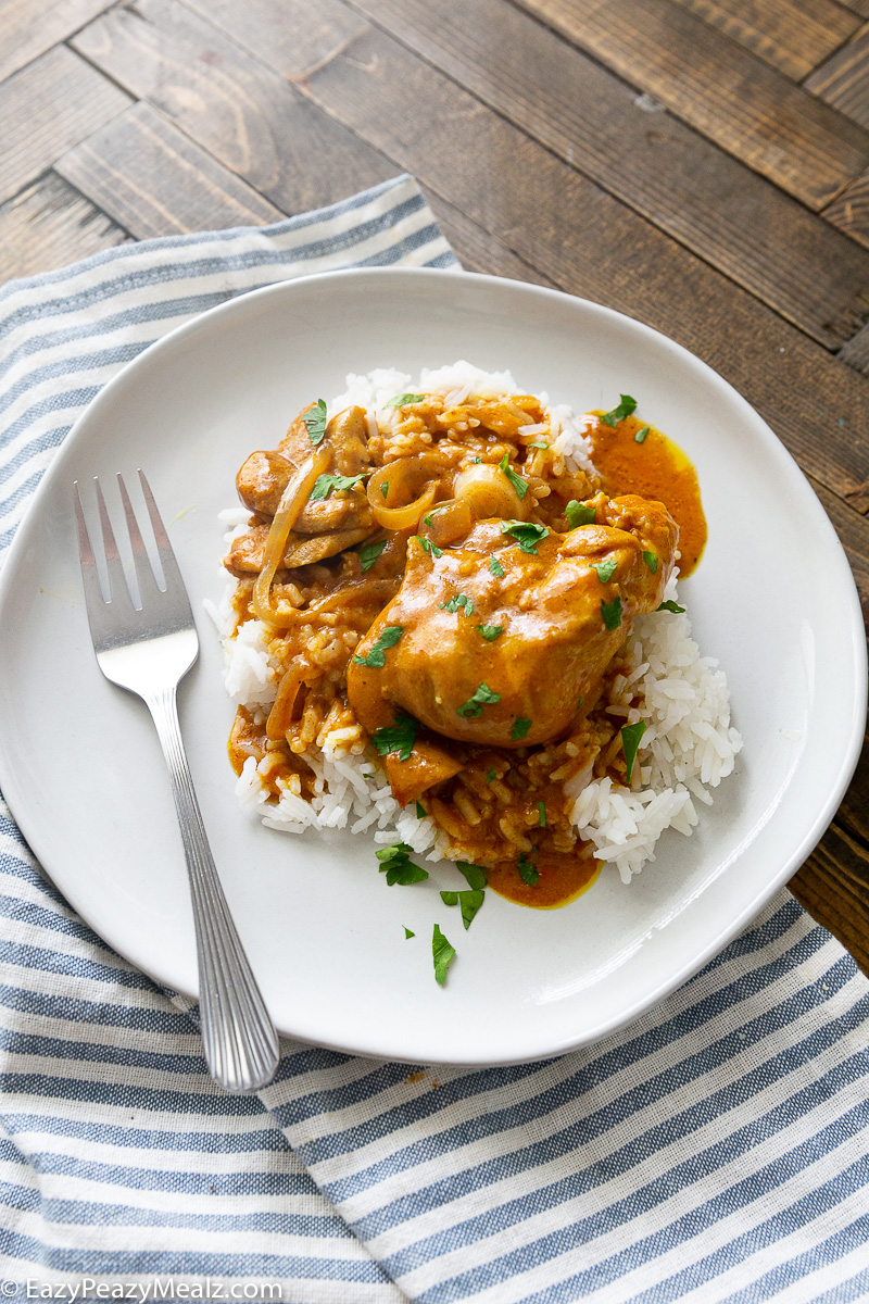 A plate of rice with slow cooker butter chicken