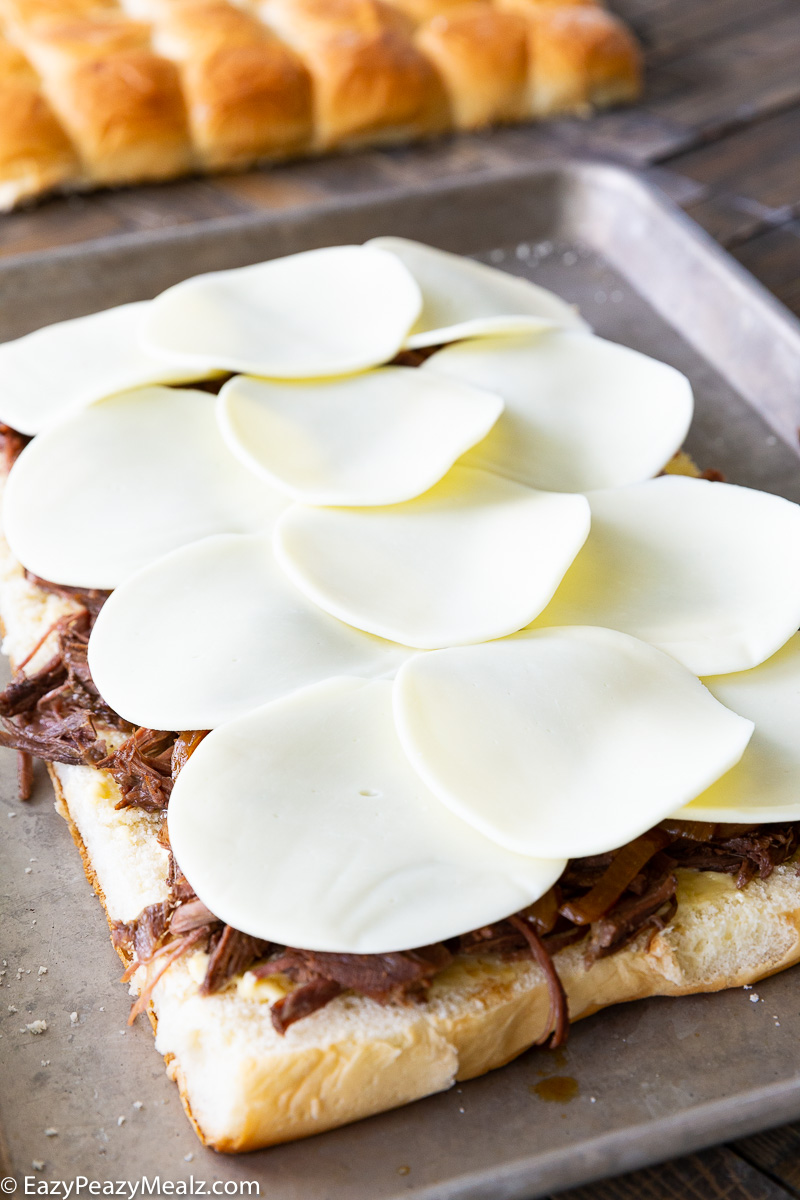 Topping french dip sliders