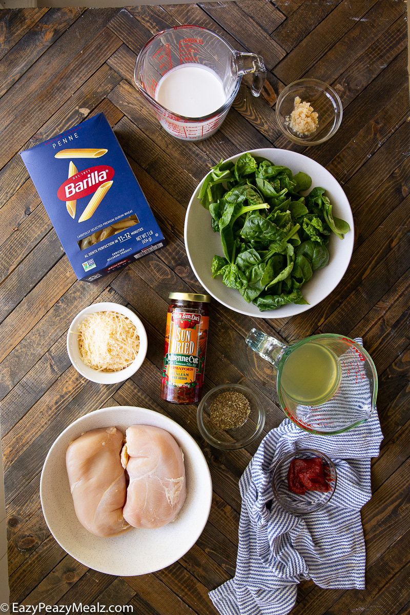 All the ingredients you need for marry me chicken pasta made in the slow cooker.