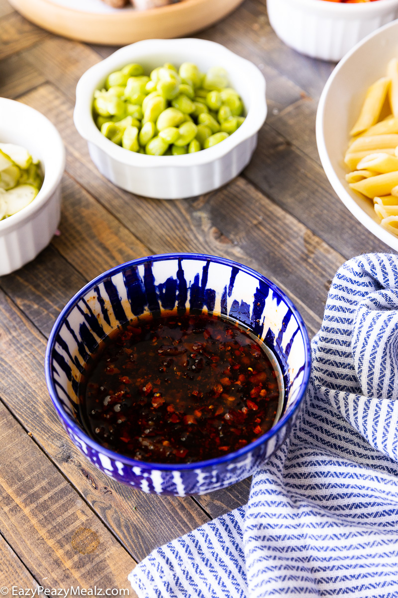 Mix up the dressing for pasta salad.
