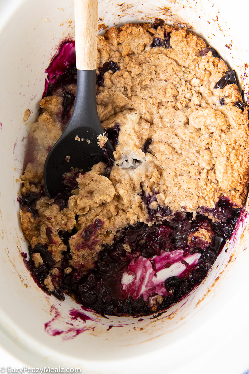 Making crockpot blueberry cobbler, a slow cooker full of delicious dessert.