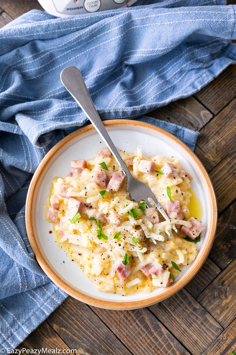 Slow cooker Cheesy ham and potatoes, a simple casserole that is full of flavor.