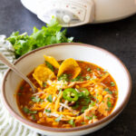 Chicken enchilada soup cooked in the slow cooker