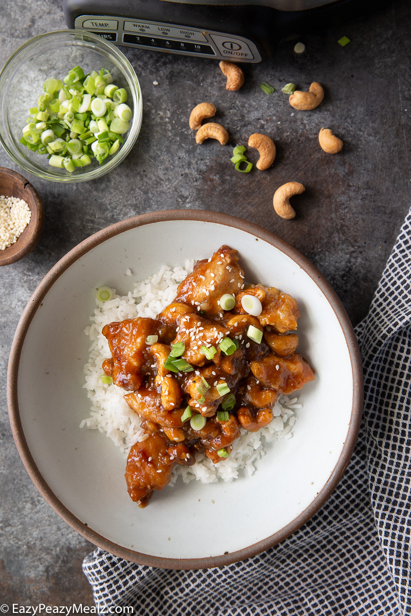 A bowl of cashew chicken that was made in the slow cooker