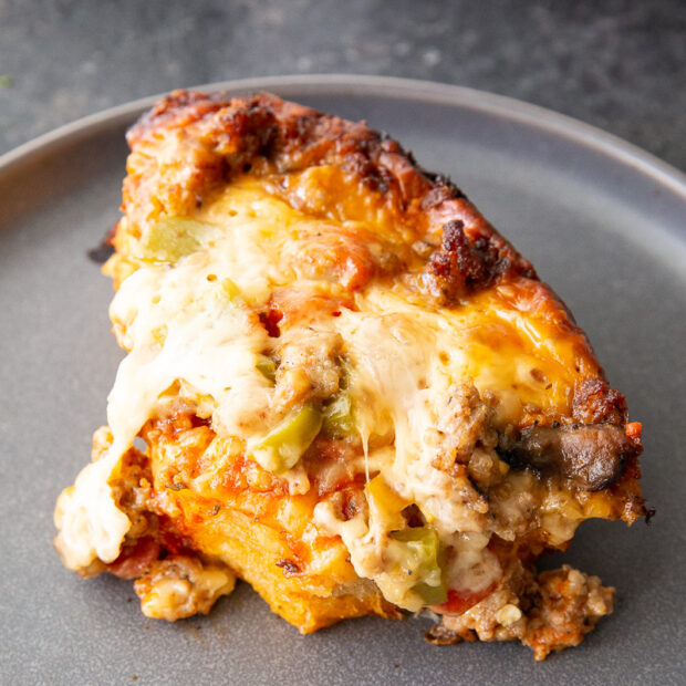 Pizza made in the slow cooker, a cross between pizza and casserole.